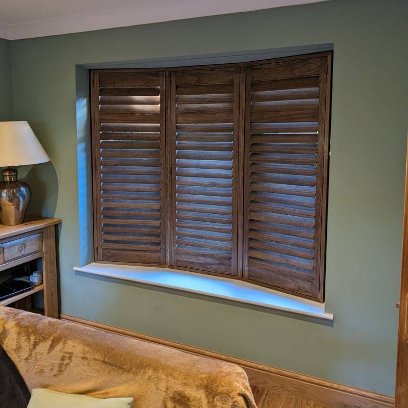 Wooden bay window shutters.