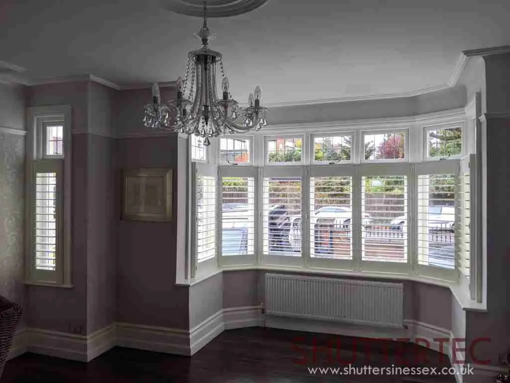 Cafe style shutters in a bay window.